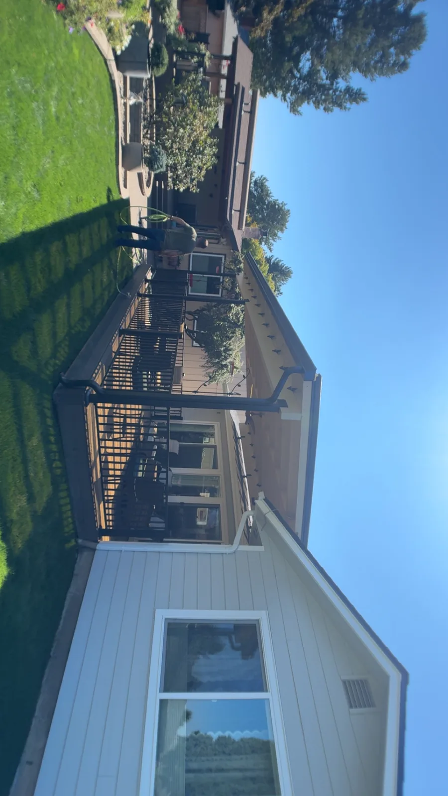 Exterior view of a completed Signature covered patio structure attached to a home, Clark County WA